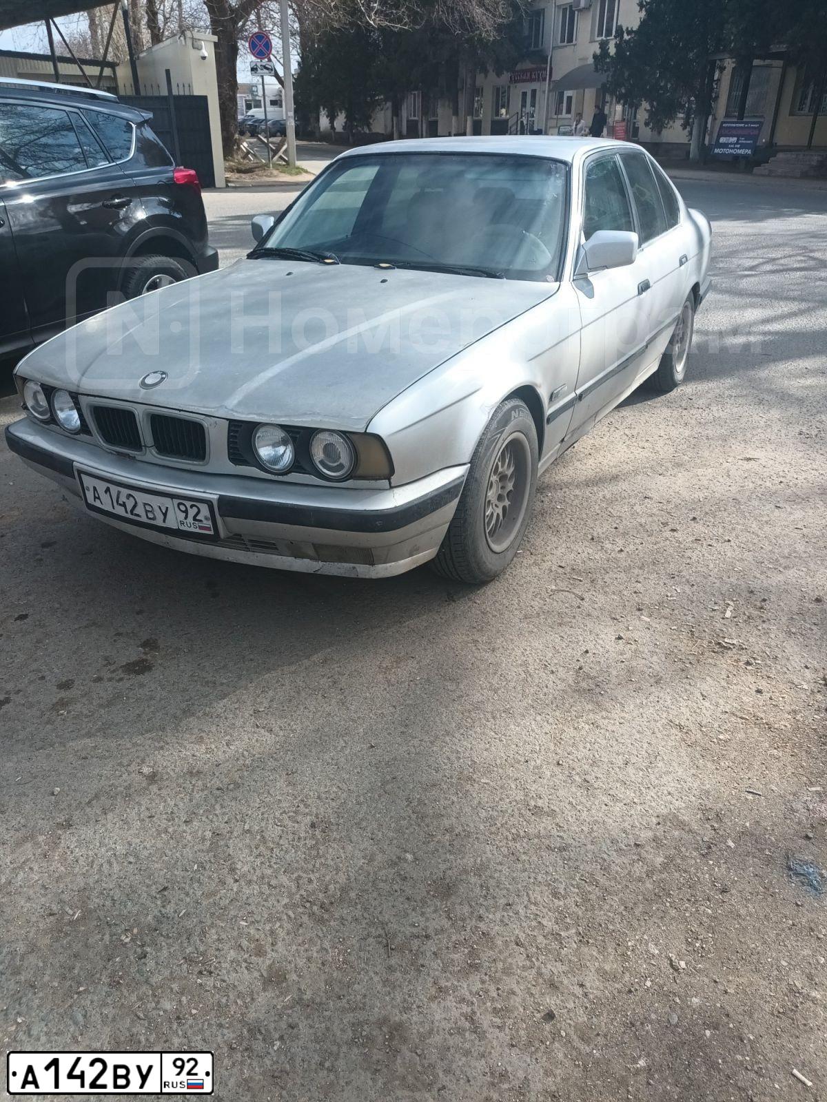 Фото автомобиля BMW 520, 1988 — госномер Р251КС180