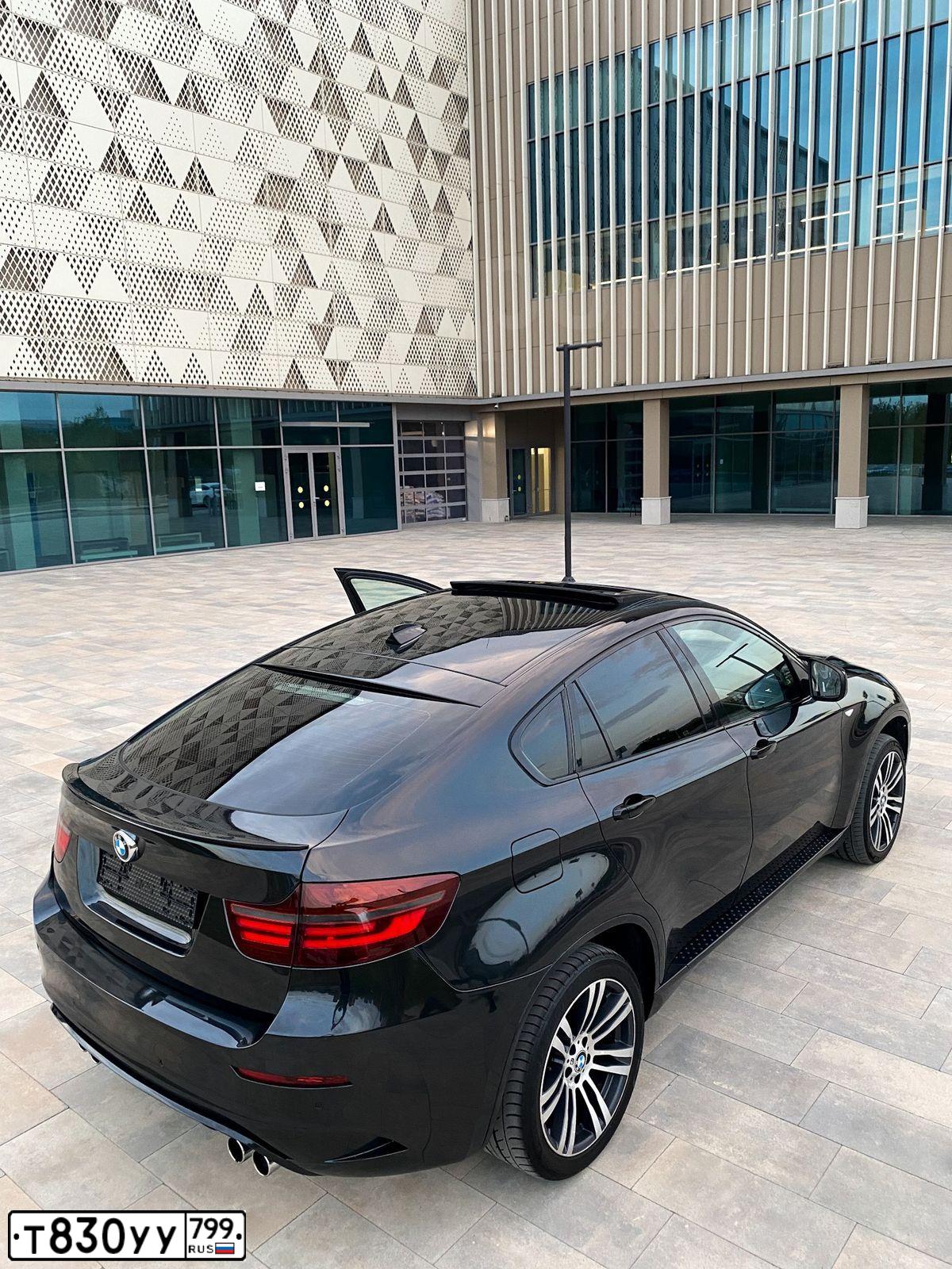 Фото автомобиля BMW X6, 2008 — госномер Т830УУ799. Цвет: ЧЕРНЫЙ