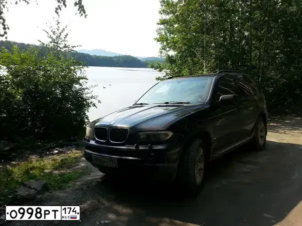 Фото автомобиля BMW X5, 2005 — госномер О998РТ174. Цвет: ЧЕРНЫЙ