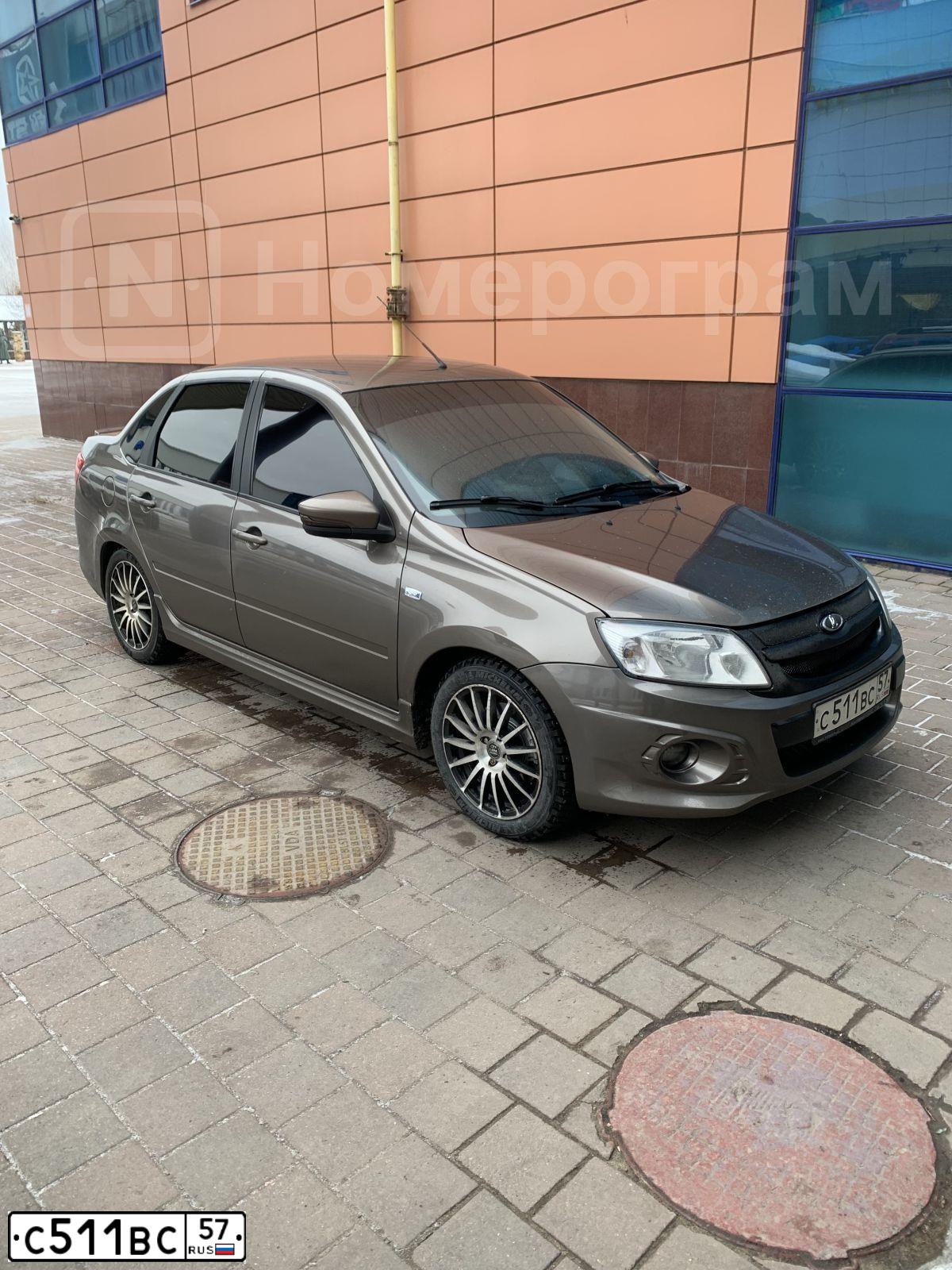 Фото автомобиля LADA 2190 GRANTA, 2016 — госномер Р877УМ33. Цвет: Золотисто-коричневый