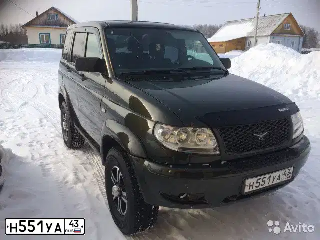 Фото автомобиля UAZ 3164 PATRIOT, 2010 — госномер Р663ОР43. Цвет: золотистый лист металлик