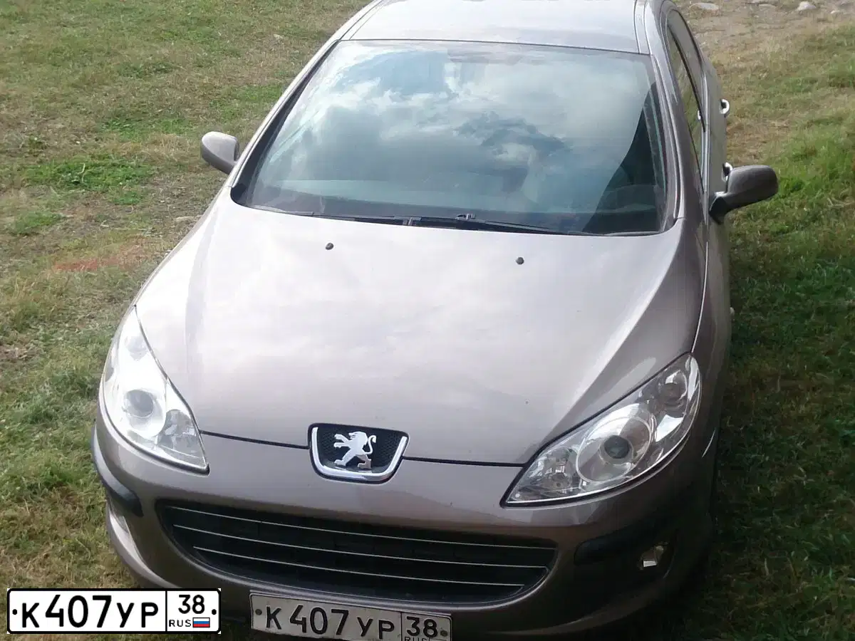 Фото автомобиля PEUGEOT 407, 2006 — госномер К407УР38. Цвет: СЕРЫЙ