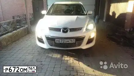 Фото автомобиля MAZDA CX-7, 2011 — госномер Р672ОМ161. Цвет: Белый