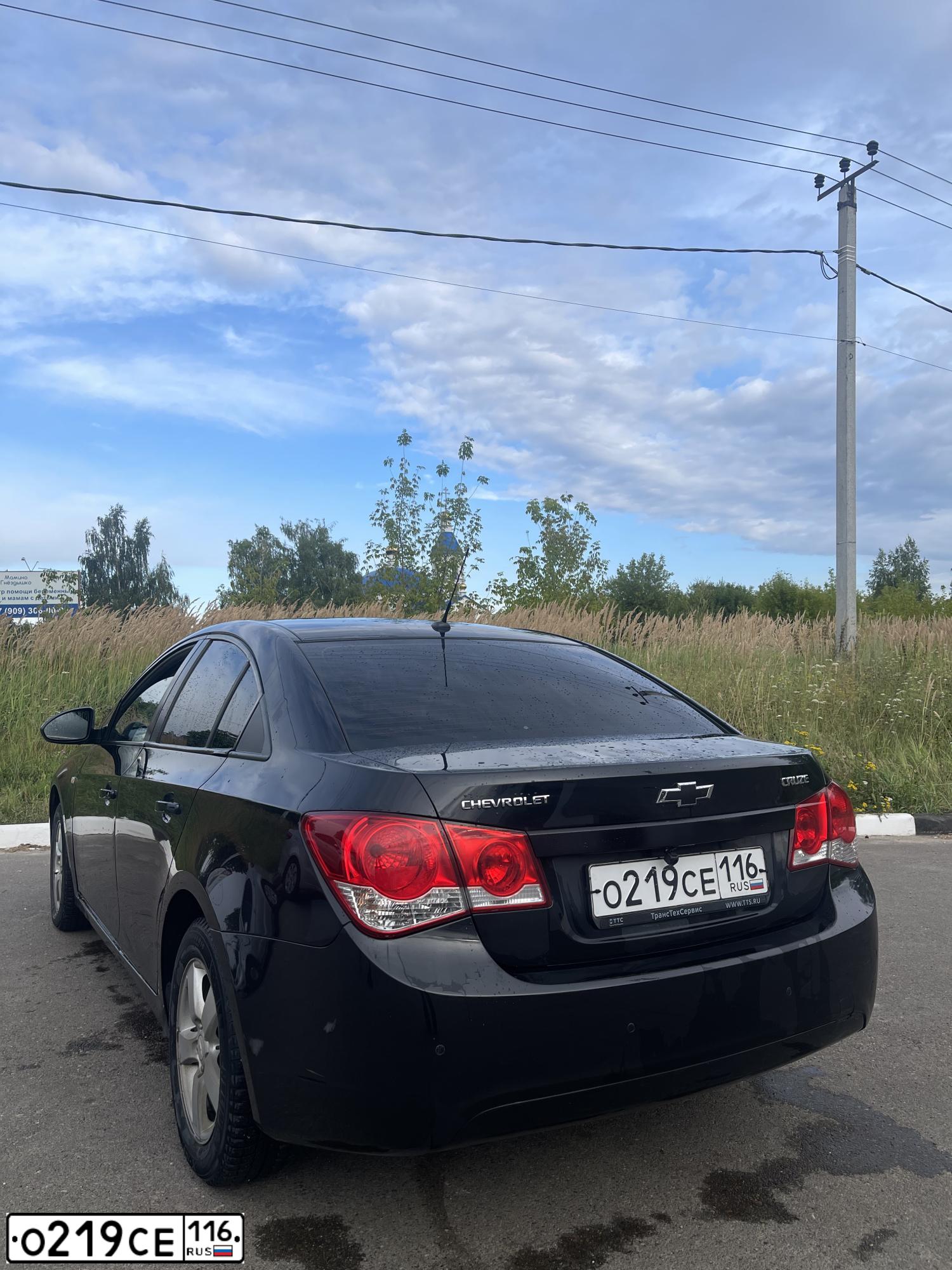 Фото автомобиля CHEVROLET CRUZE, 2011 — госномер О219СЕ116. Цвет: ЧЕРНЫЙ МЕТАЛЛИК