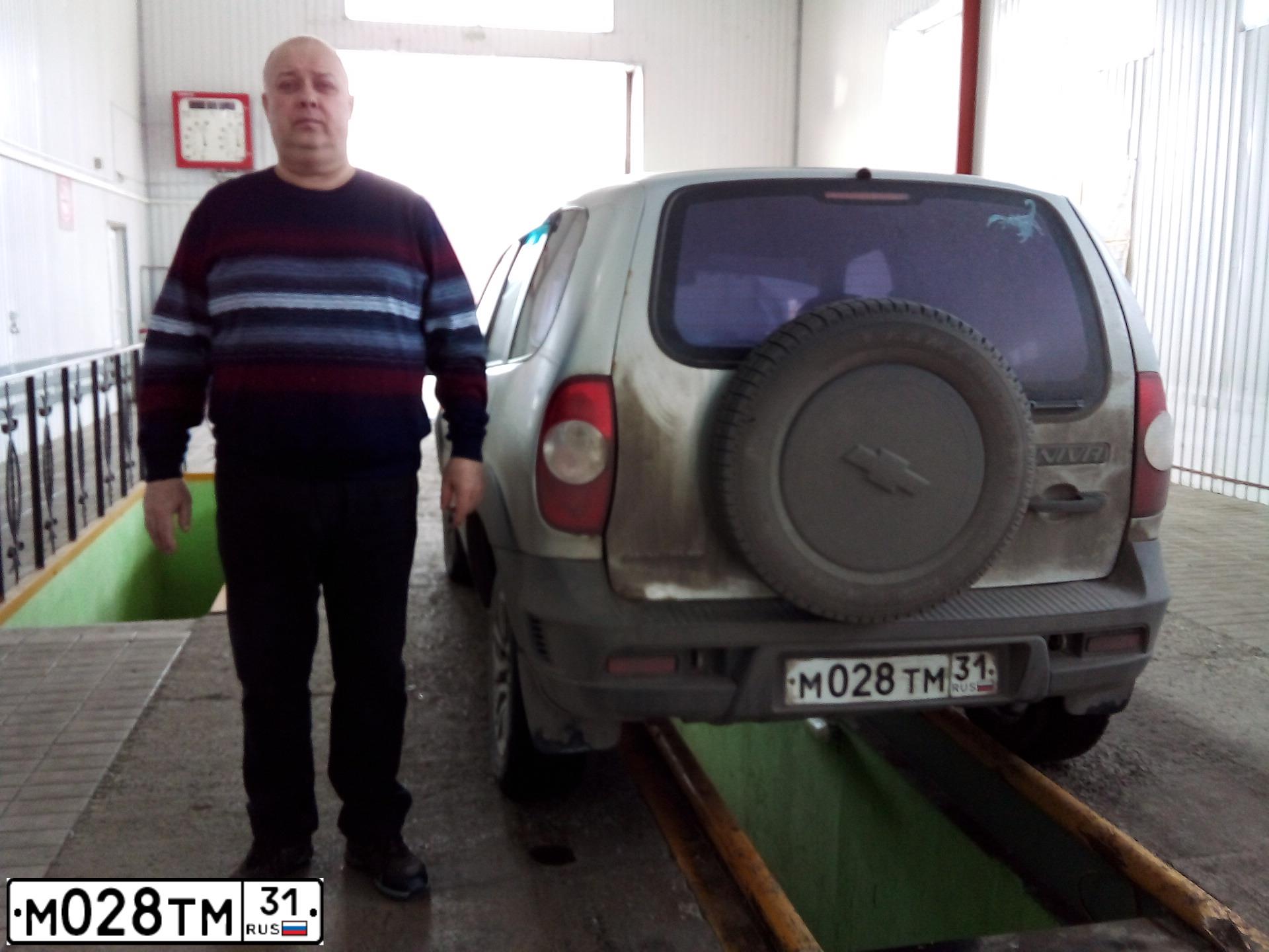 Фото автомобиля CHEVROLET NIVA, 2010 — госномер Н146УК35