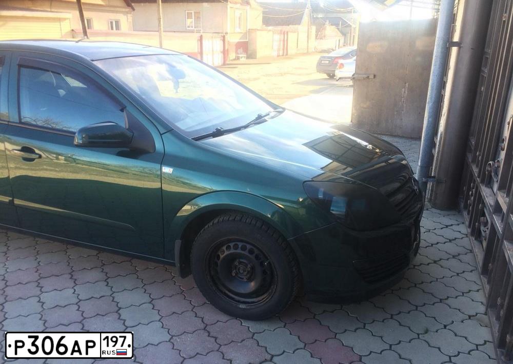Фото автомобиля OPEL ASTRA, 2004 — госномер Т922УО71. Цвет: Темно-зеленый