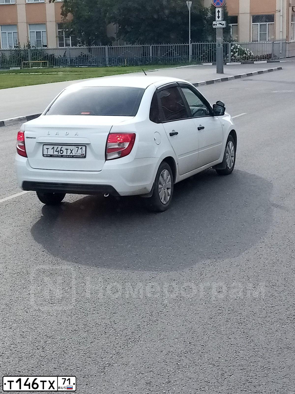 Фото автомобиля LADA 2190 GRANTA, 2019 — госномер Т146ТХ71. Цвет: БЕЛЫЙ