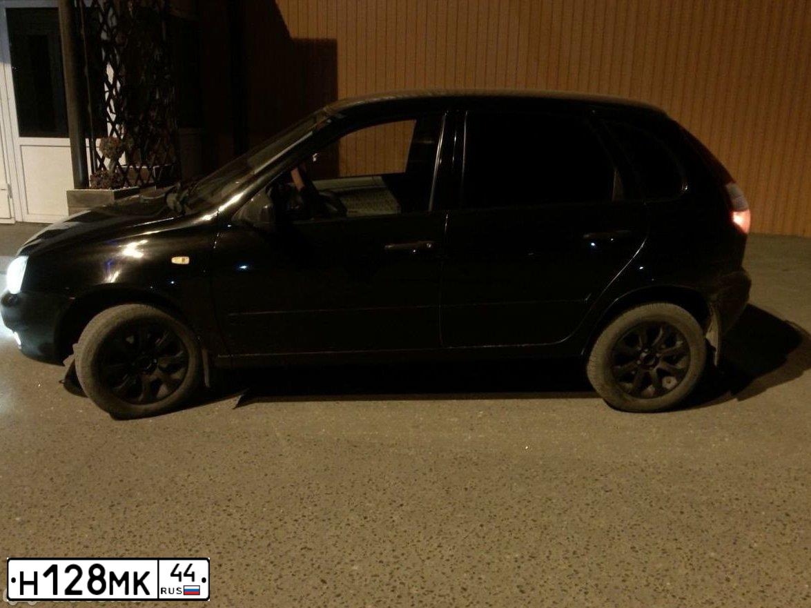 Фото автомобиля LADA 1119 KALINA, 2010 — госномер Н128МК44. Цвет: ЧЕРНЫЙ