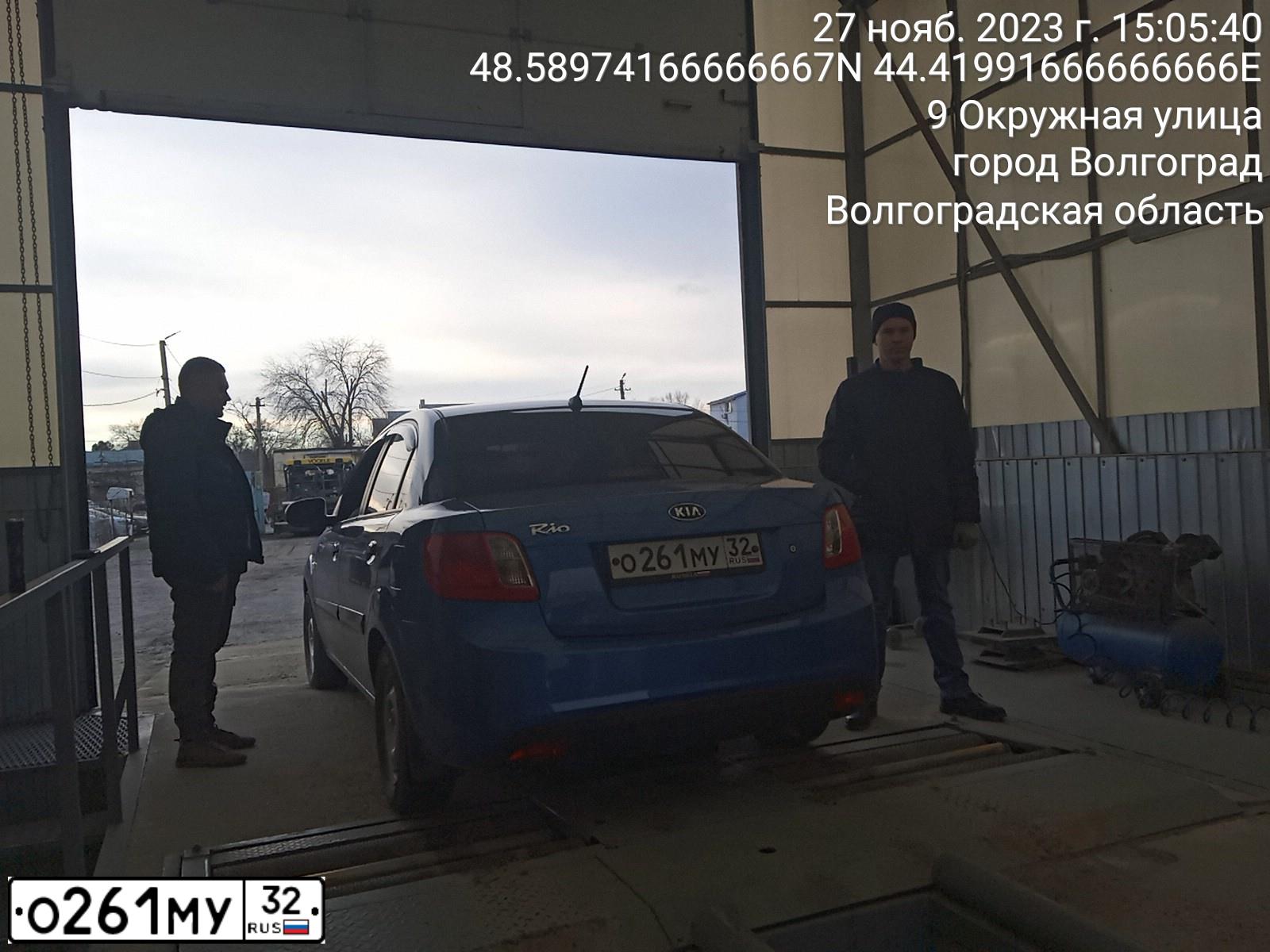 Фото автомобиля KIA RIO, 2010 — госномер Н035ВУ134. Цвет: синий