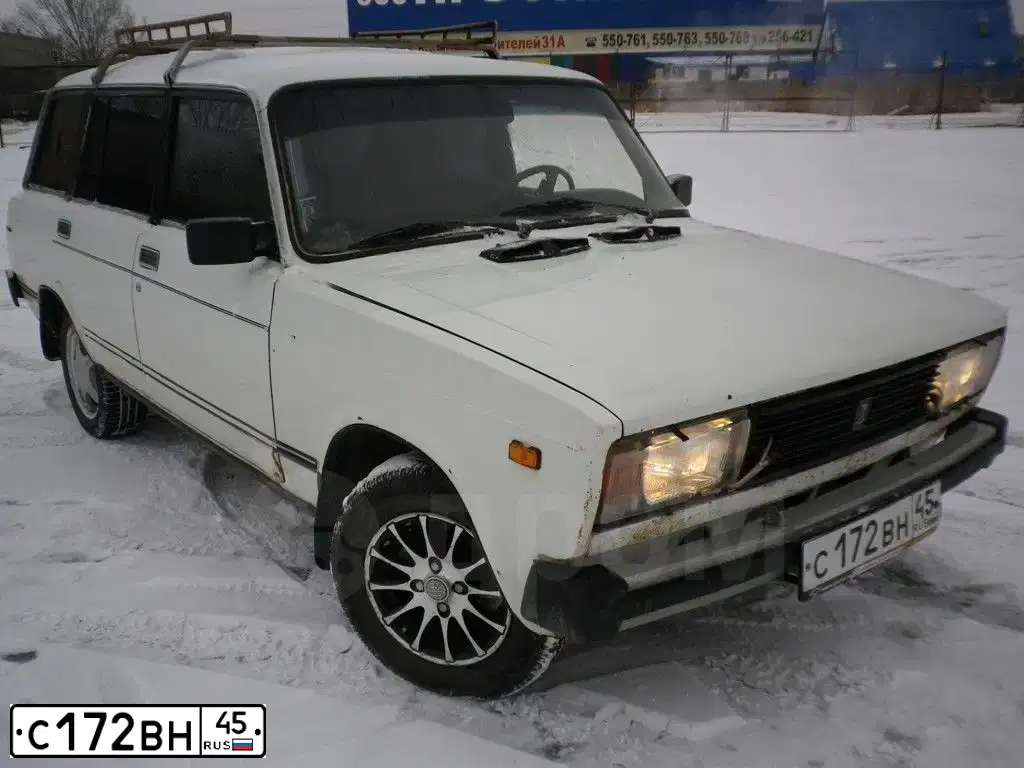 Фото автомобиля LADA 2104, 1991 — госномер С172ВН45. Цвет: БЕЛЫЙ