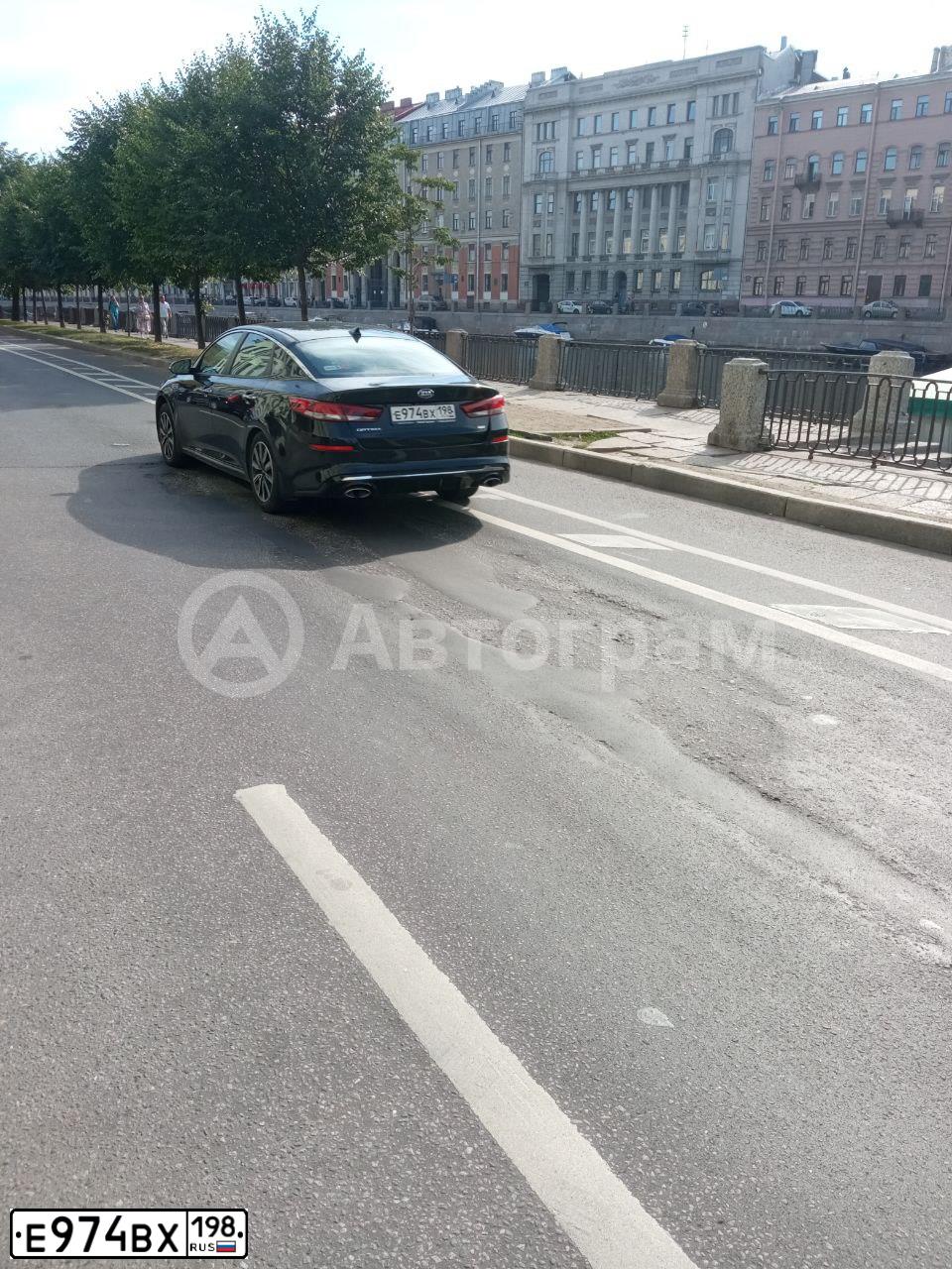 Фото автомобиля KIA MAGENTIS / OPTIMA, 2019 — госномер Е974ВХ198. Цвет: ЧЕРНЫЙ