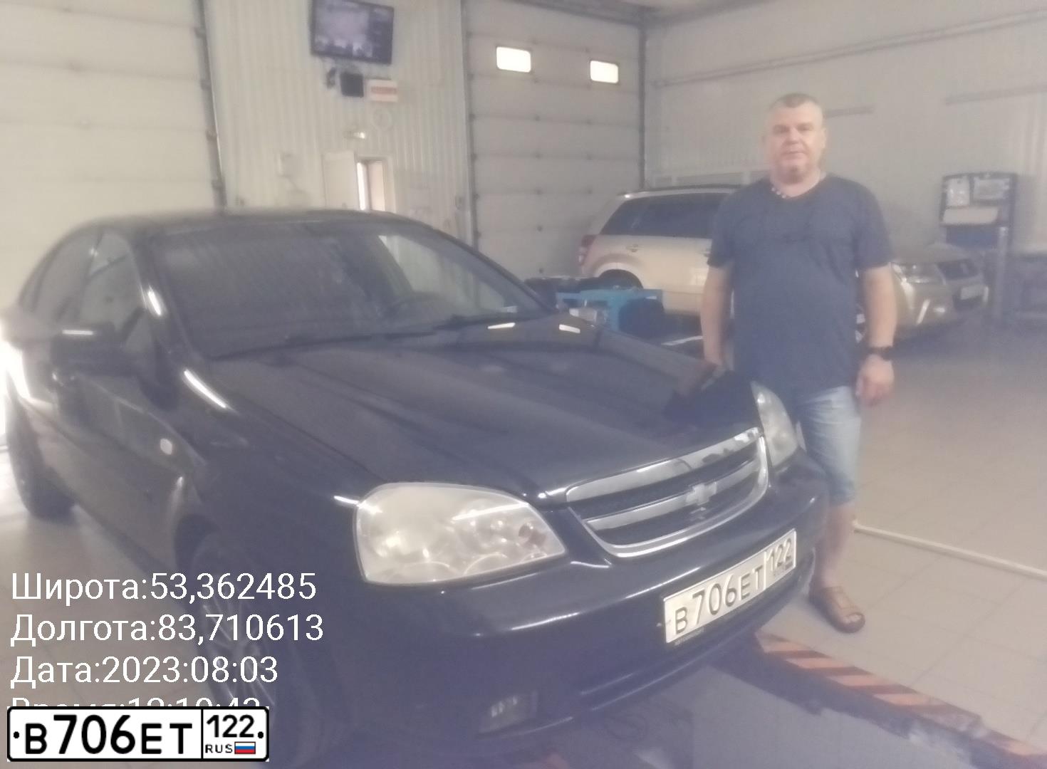 Фото автомобиля CHEVROLET LACETTI, 2012 — госномер Х002ХХ71. Цвет: ЧЕРНЫЙ