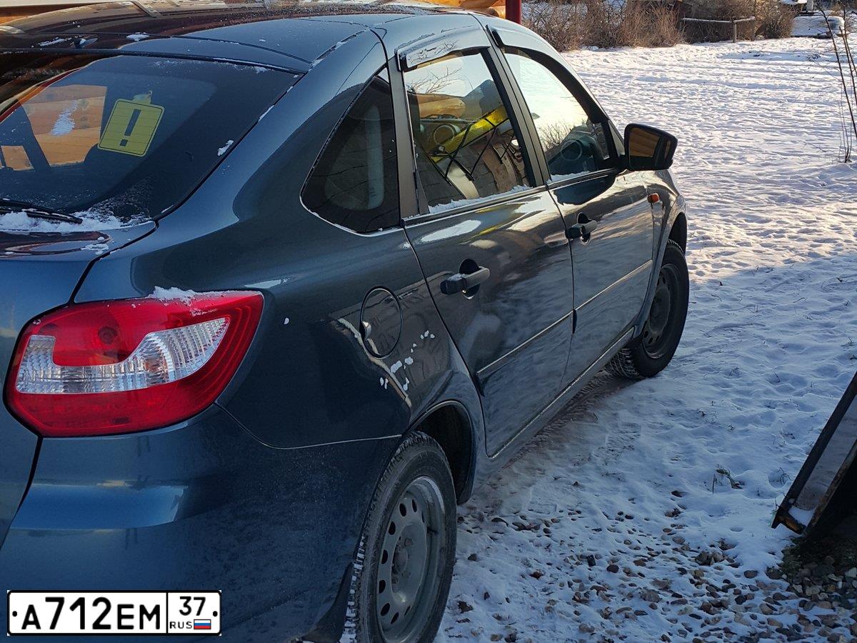 Фото автомобиля LADA 2191 GRANTA, 2014 — госномер А712ЕМ37. Цвет: СЕРО-СИНИЙ