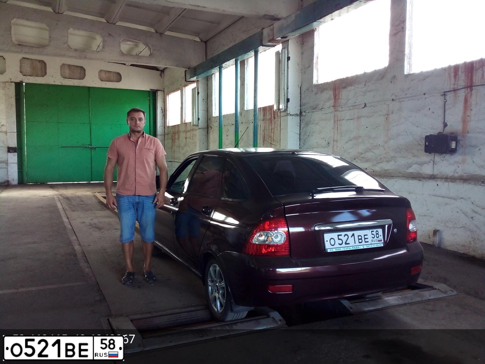 Фото автомобиля LADA 2172 PRIORA, 2012 — госномер О521ВЕ58. Цвет: ТЕМНО-ВИШНЕВЫЙ
