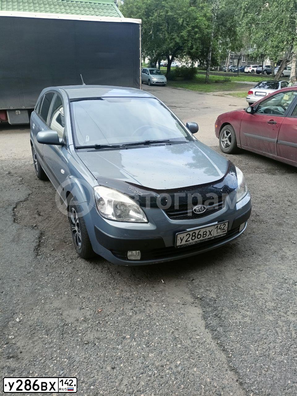Фото автомобиля KIA RIO, 2009 — госномер У286ВХ142. Цвет: ТЕМНО СЕРЫЙ