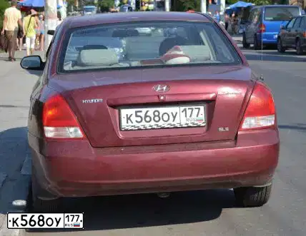 Фото автомобиля HYUNDAI ELANTRA, 2001 — госномер Х619ОК199. Цвет: ВИШНЕВЫЙ