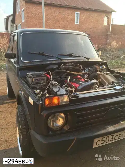 Фото автомобиля LADA 2121 NIVA, 1993 — госномер Н294ЕВ02. Цвет: ЧЕРНЫЙ