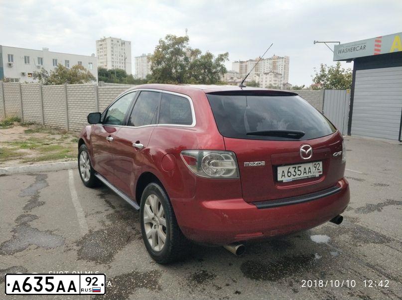Фото автомобиля MAZDA  CX7, 2008 — госномер В844ВТ92. Цвет: Красный