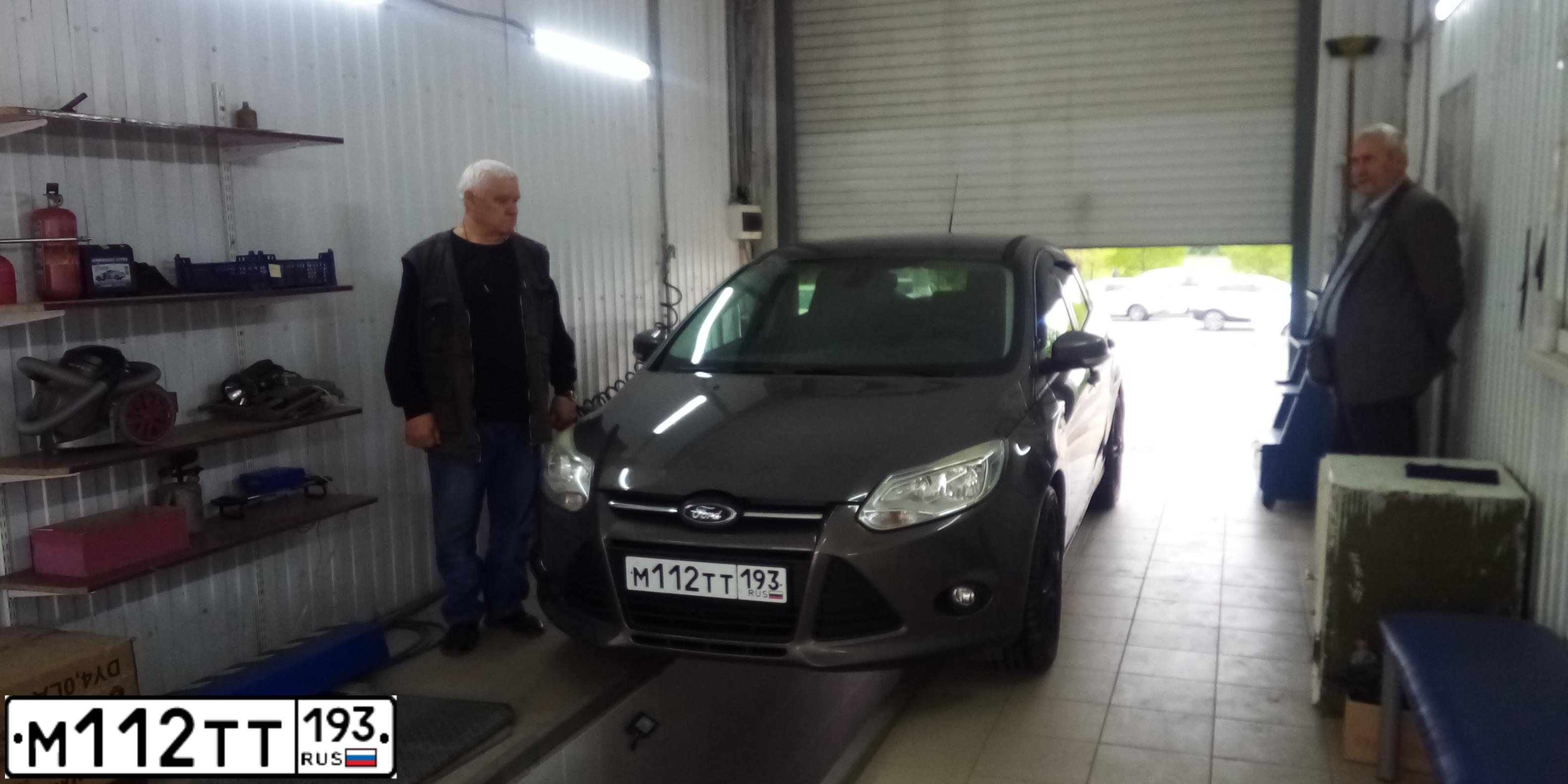 Фото автомобиля FORD FOCUS, 2014 — госномер Н350ХТ82. Цвет: Коричневый