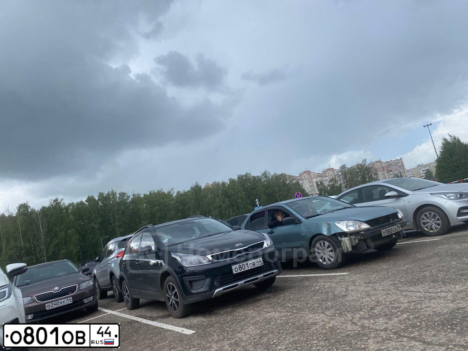 Фото автомобиля KIA RIO, 2019 — госномер О801ОВ44. Цвет: ЧЕРНЫЙ