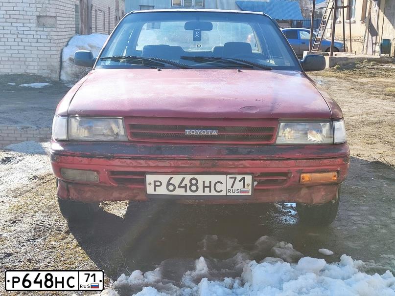 Фото автомобиля TOYOTA CARINA, 1990 — госномер Р648НС71. Цвет: Красный