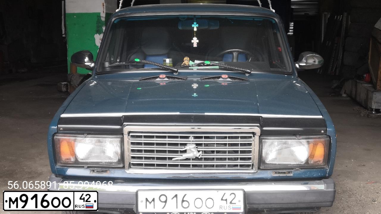 Фото автомобиля LADA 2107, 2006 — госномер М916ОО42. Цвет: СИНЕ ЗЕЛЕНЫЙ