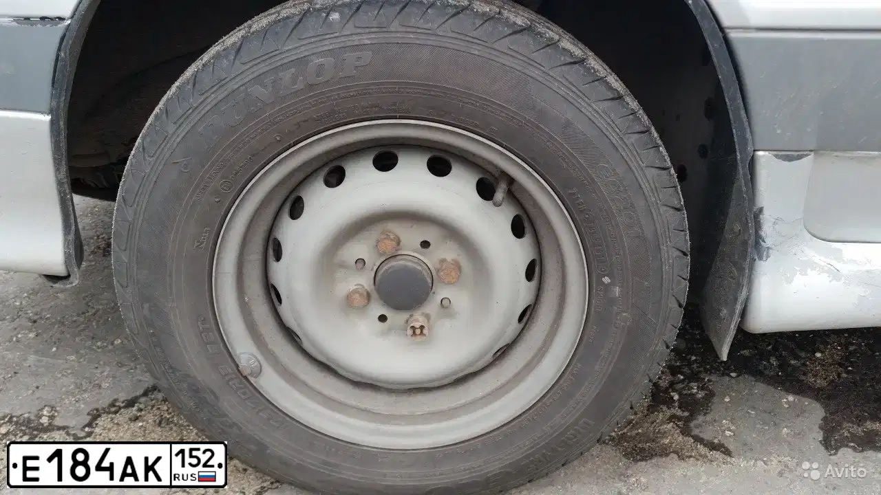 Фото автомобиля LADA 2115 SAMARA, 2005 — госномер Е184АК152. Цвет: СВЕТЛО-СЕРЫЙ