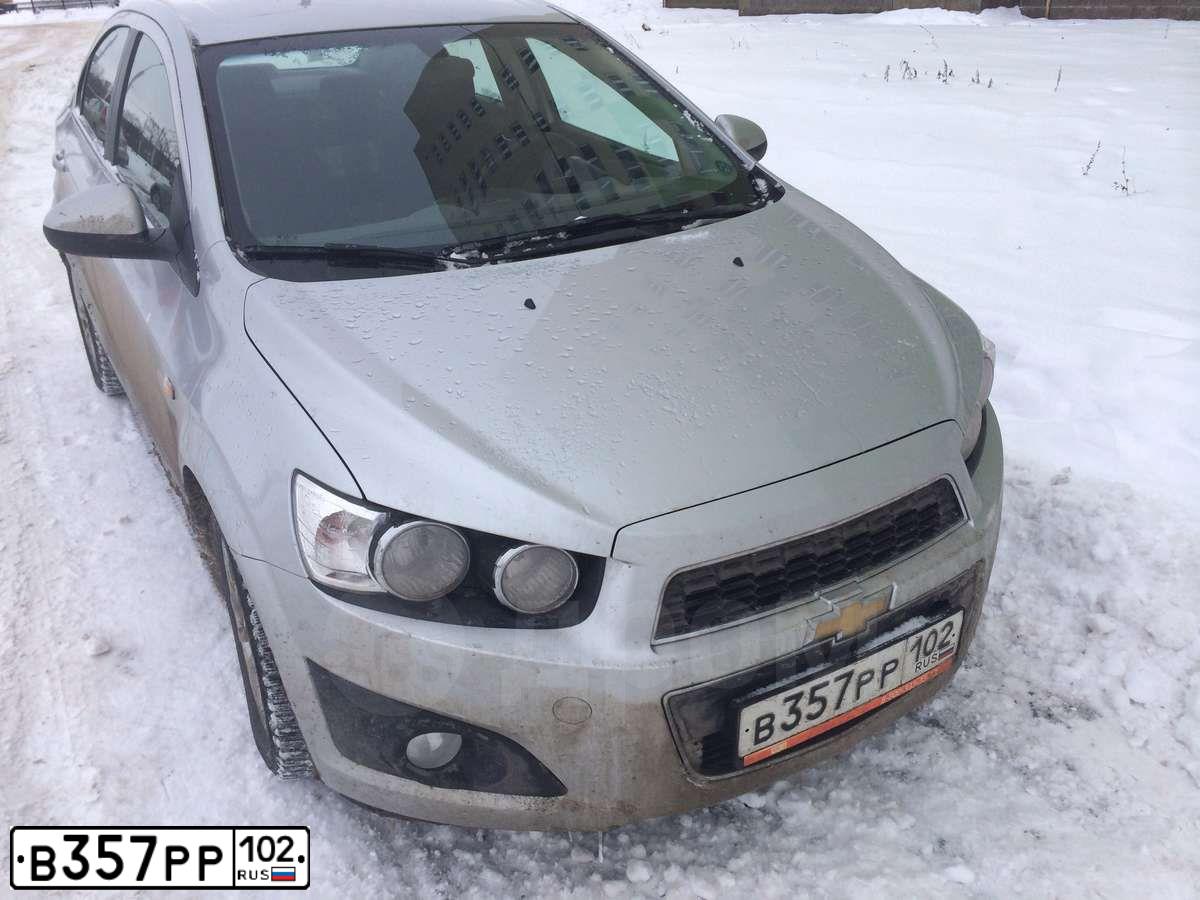 Фото автомобиля CHEVROLET AVEO, 2012 — госномер В357РР102. Цвет: Серебристый