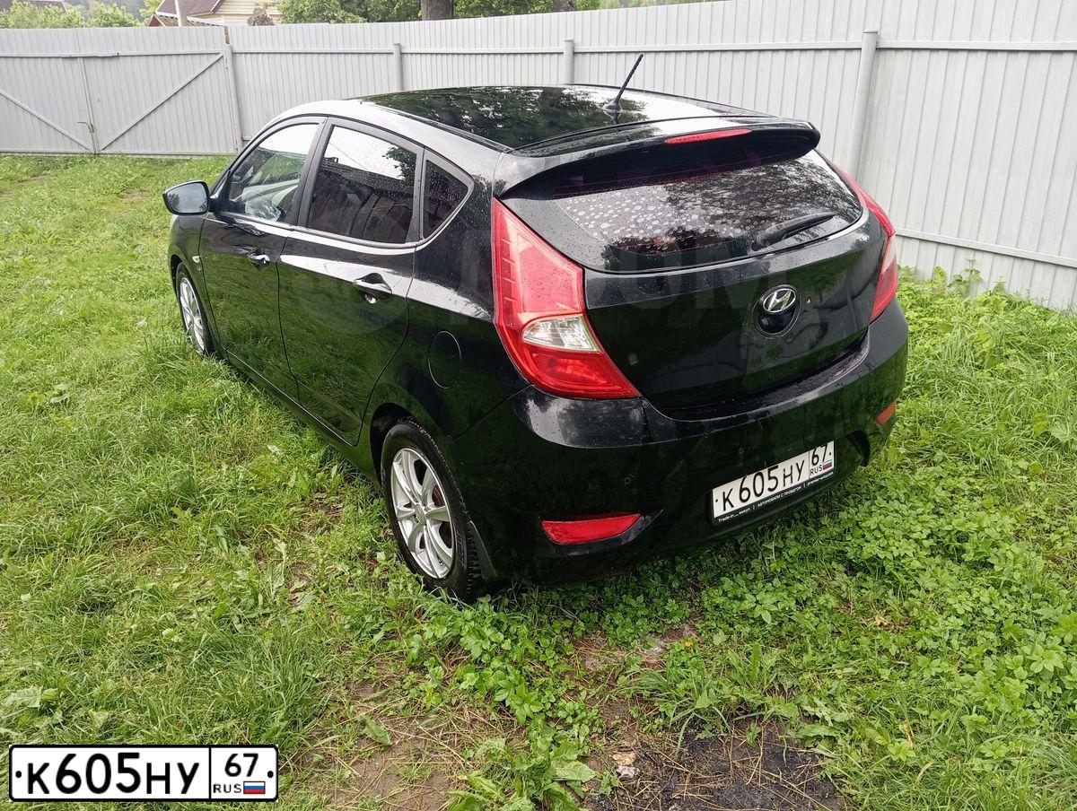 Фото автомобиля HYUNDAI SOLARIS, 2012 — госномер К605НУ67. Цвет: ЧЕРНЫЙ