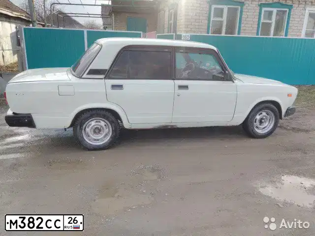 Фото автомобиля LADA 2107, 1997 — госномер В912УК126. Цвет: Белый