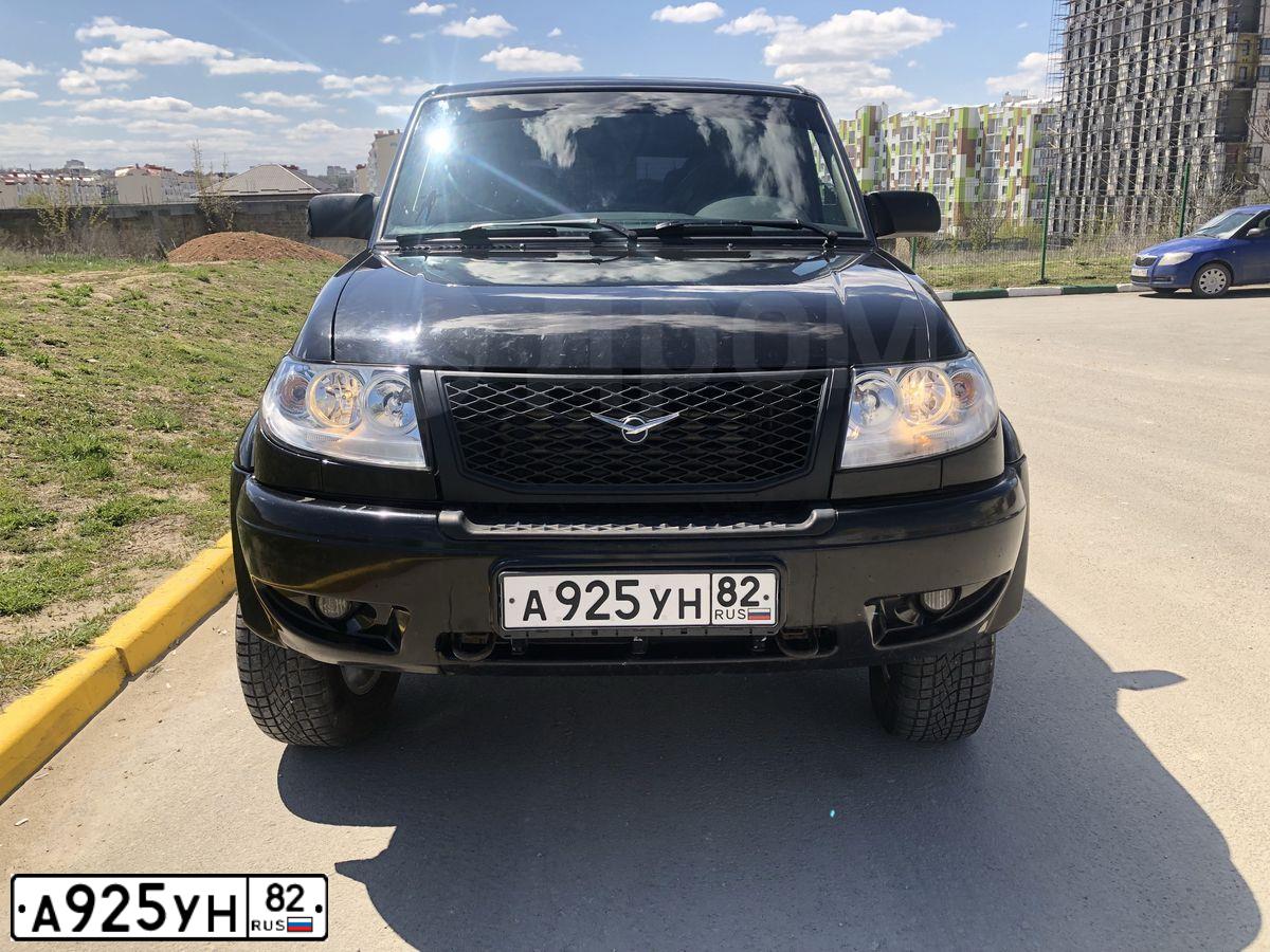 Фото автомобиля UAZ 3163 PATRIOT, 2013 — госномер А065РС92. Цвет: ЧЕРНЫЙ