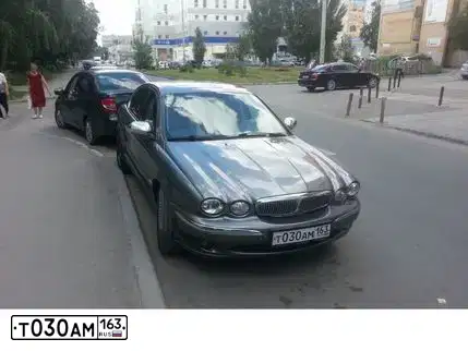 Фото автомобиля JAGUAR X-TYPE, 2008 — госномер Е297ЕУ702. Цвет: ТЕМНО-СЕРЫЙ