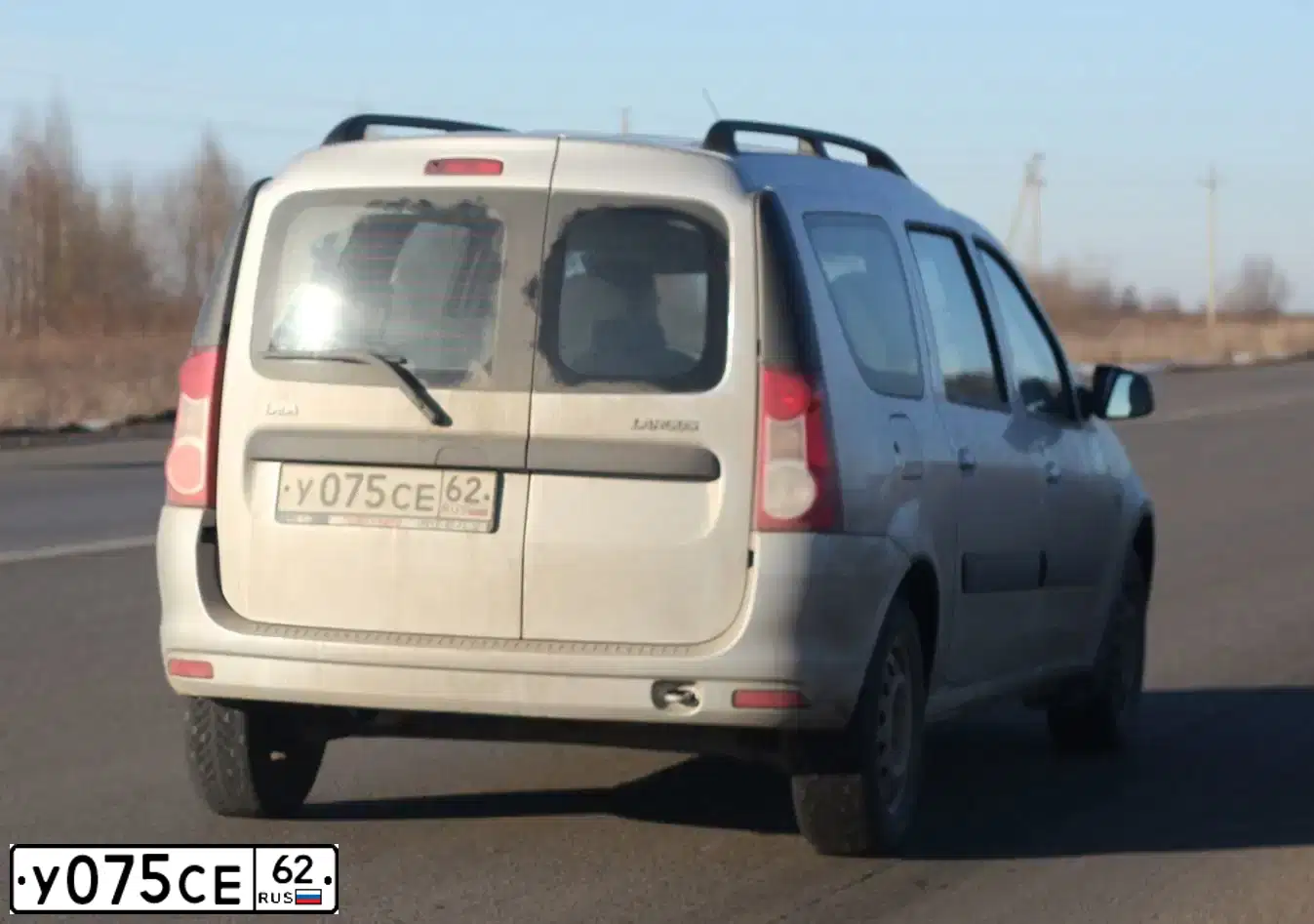Фото автомобиля LADA LARGUS, 2014 — госномер С245ТЕ62. Цвет: СЕРЕБРИСТЫЙ ЗЕЛЕНЫЙ