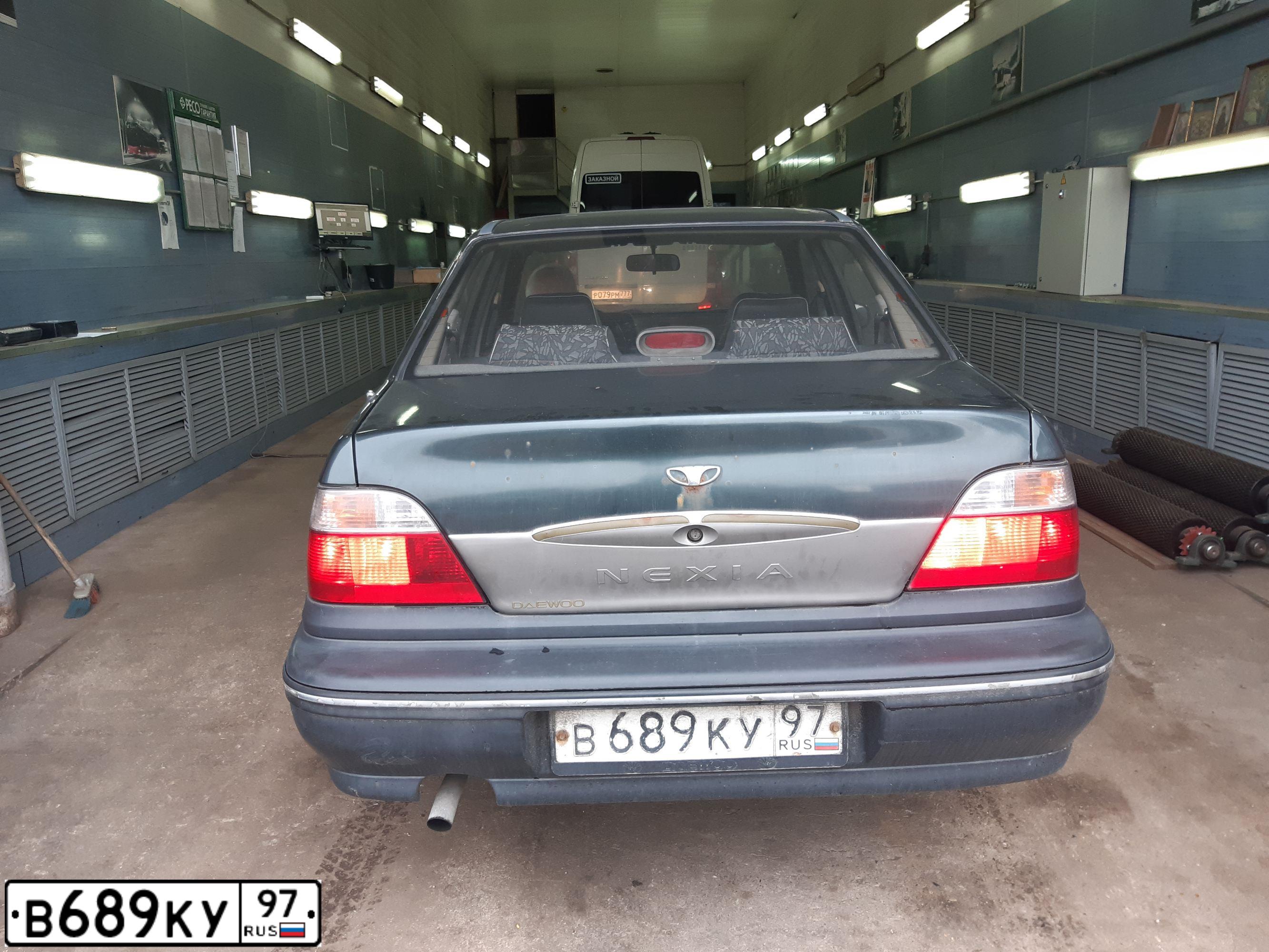 Фото автомобиля DAEWOO NEXIA, 2003 — госномер Р050НН97. Цвет: ЗЕЛЕНЫЙ