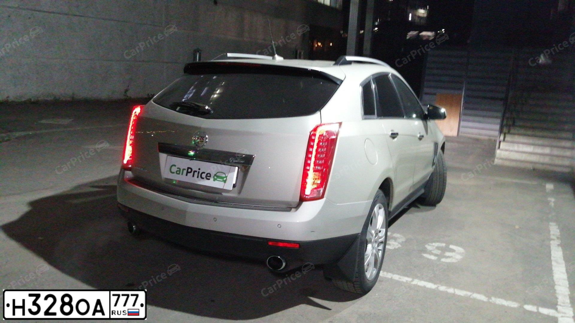 Фото автомобиля CADILLAC SRX, 2013 — госномер М212ТР21. Цвет: Светло-Золотистый Металлик