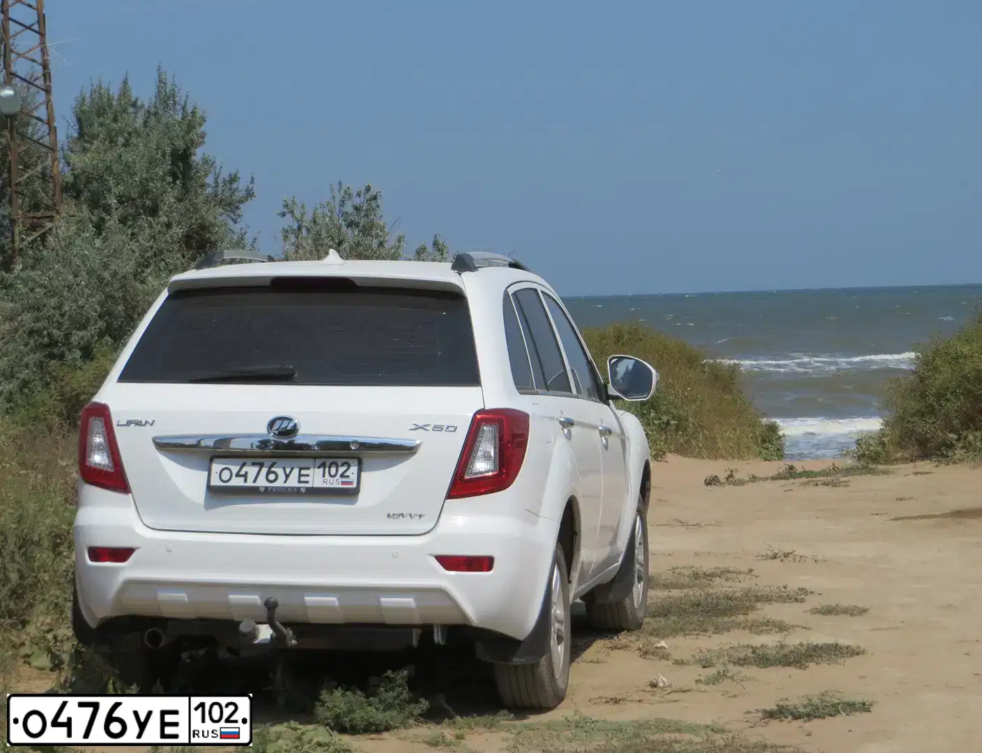 Фото автомобиля LIFAN X 60, 2013 — госномер Е494АТ774. Цвет: Белый
