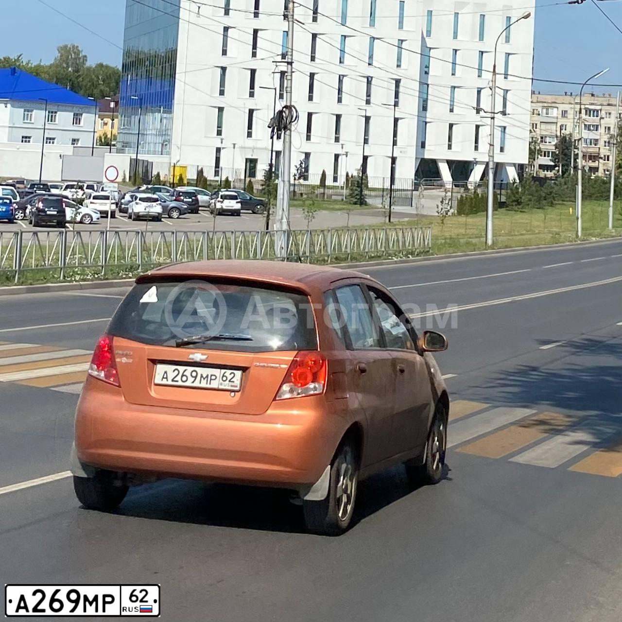Фото автомобиля CHEVROLET AVEO, 2007 — госномер А269МР62. Цвет: ОРАНЖЕВЫЙ