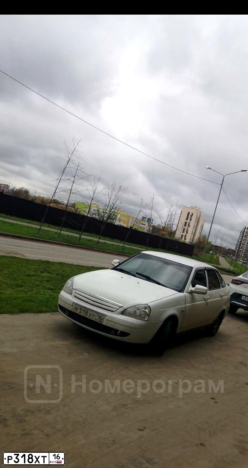 Фото автомобиля LADA 2172 PRIORA, 2009 — госномер М204НТ702. Цвет: Белый