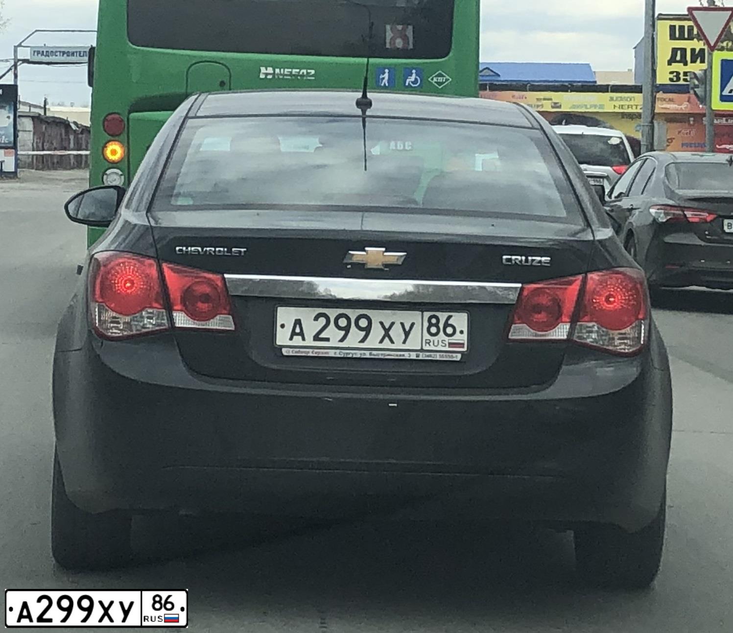 Фото автомобиля CHEVROLET CRUZE, 2012 — госномер А299ХУ86. Цвет: ЧЕРНЫЙ МЕТАЛЛИК