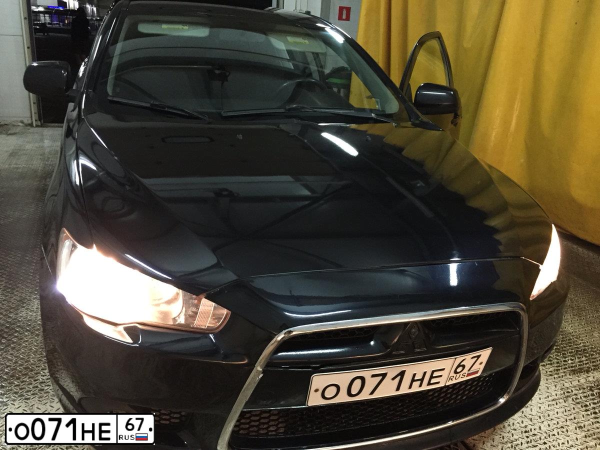 Фото автомобиля MITSUBISHI LANCER, 2007 — госномер Е232ХТ777. Цвет: ЧЕРНЫЙ