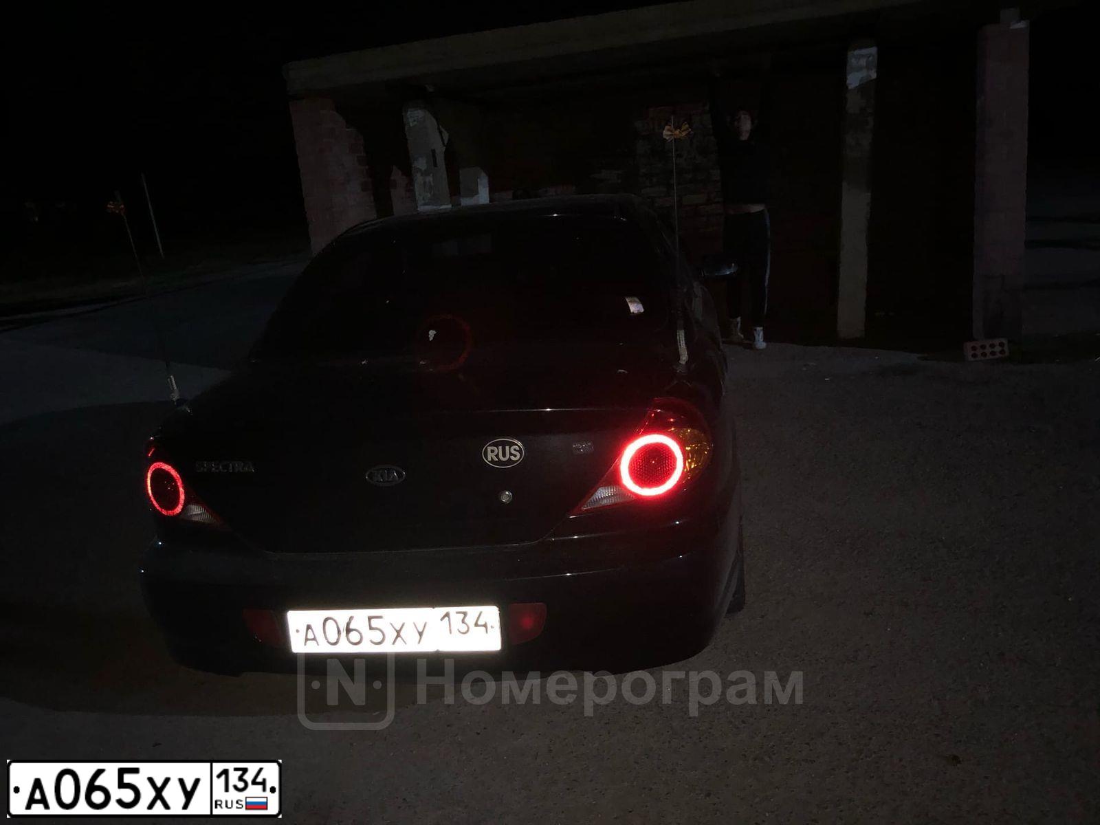 Фото автомобиля KIA SPECTRA, 2007 — госномер А065ХУ134. Цвет: ЧЕРНЫЙ