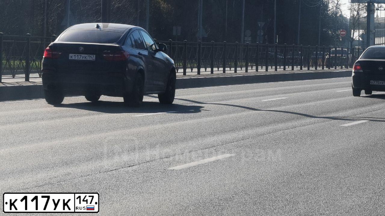 Фото автомобиля BMW X4, 2014 — госномер К117УК147. Цвет: Темно-синий