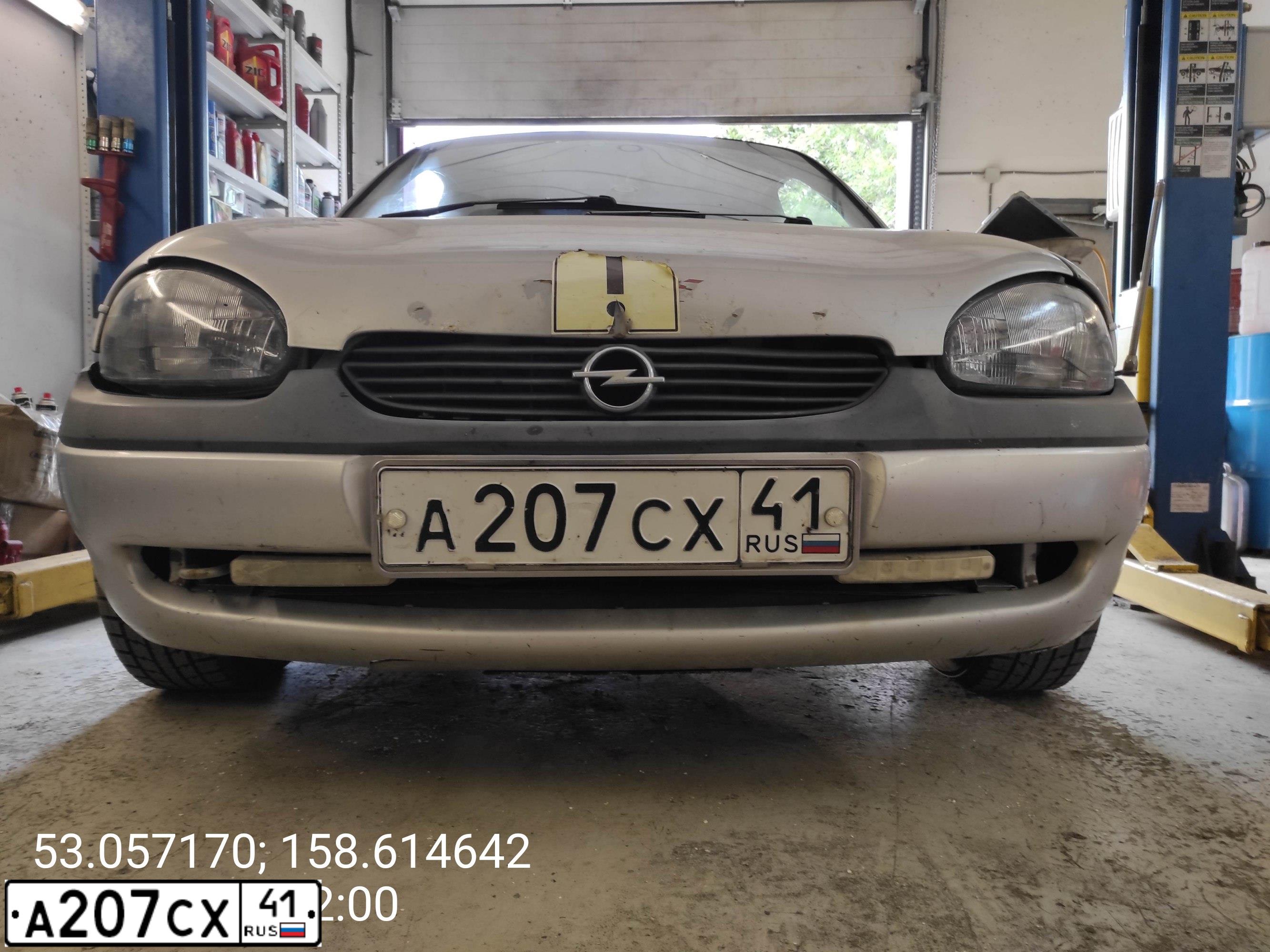 Фото автомобиля OPEL CORSA, 1999 — госномер А207СХ41. Цвет: СЕРЫЙ