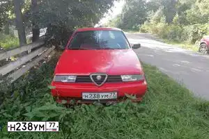 Фото автомобиля ALFAROMEO ALFA 155, 1993 — госномер Н238УМ77. Цвет: КРАСНЫЙ