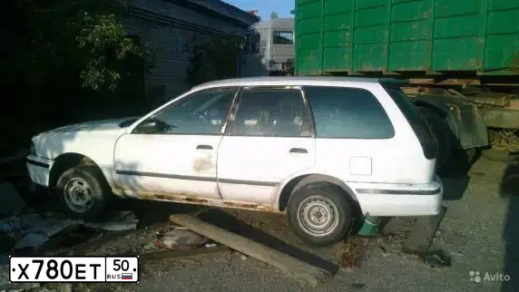 Фото автомобиля AZLK MOSKWITSCH 2141, 1992 — госномер Х780ЕТ50. Цвет: ТЕМНО-КРАСНЫЙ