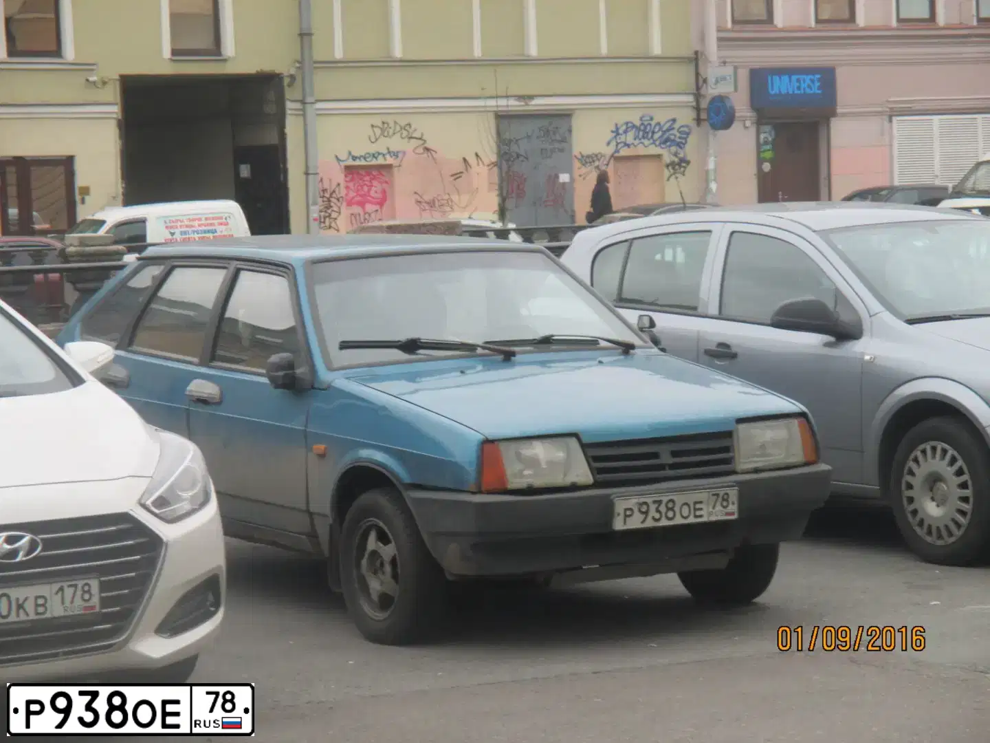 Фото автомобиля LADA 2109 SAMARA, 1998 — госномер Р938ОЕ78. Цвет: СЕРЕБРИСТО-СИНИЙ-ЗЕЛ