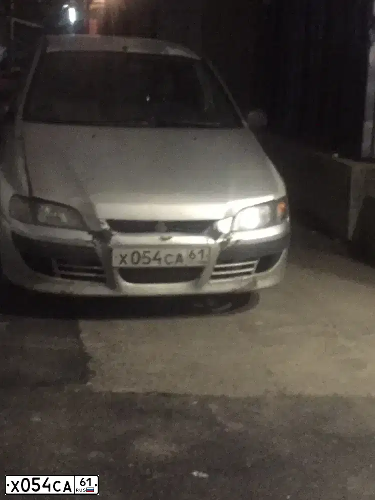 Фото автомобиля MITSUBISHI SPACE STAR, 2004 — госномер Х054СА61. Цвет: СЕРЕБРИСТЫЙ
