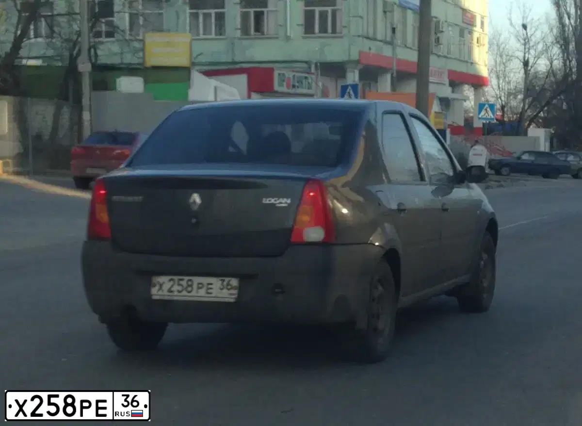 Фото автомобиля RENAULT LOGAN, 2007 — госномер Х258РЕ36. Цвет: ТЕМНО-СЕРЫЙ