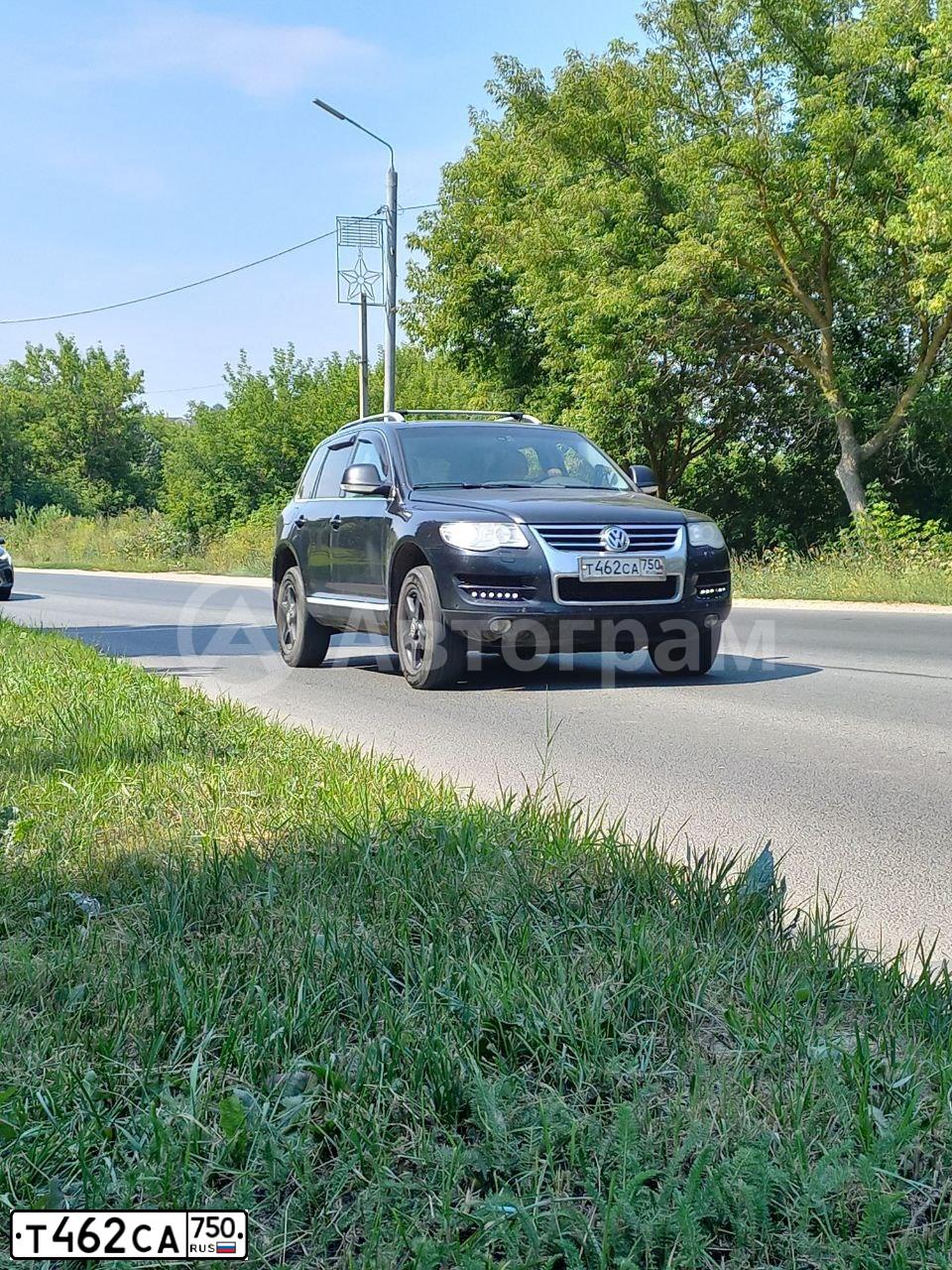 Фото автомобиля VOLKSWAGEN TOUAREG, 2008 — госномер М007КК199. Цвет: ЧЕРНЫЙ