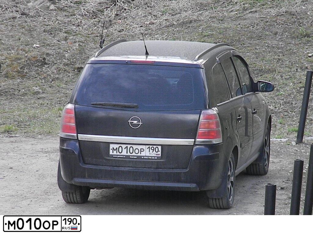 Фото автомобиля OPEL ZAFIRA, 2007 — госномер М010ОР190. Цвет: ЧЕРНЫЙ